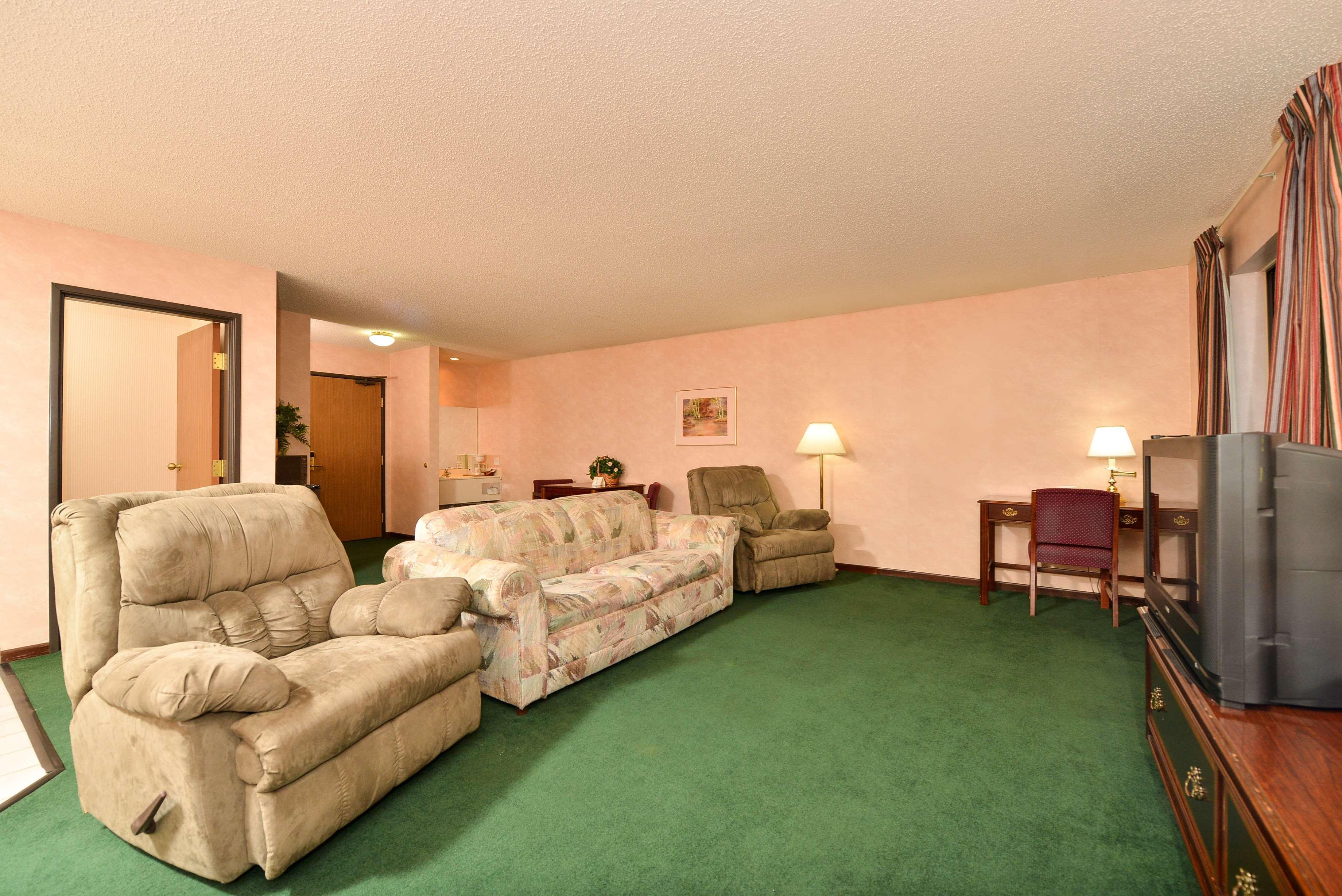 Radisson Hotel Curitiba Buitenkant foto A living room with carpet